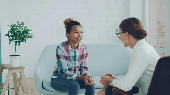 A young person in an interactive, conversation-based autism assessment session